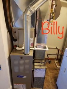 AC Unit With Pipes And Electrical Wires
