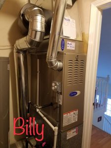 Carrier Gas Furnace In A Laundry Room